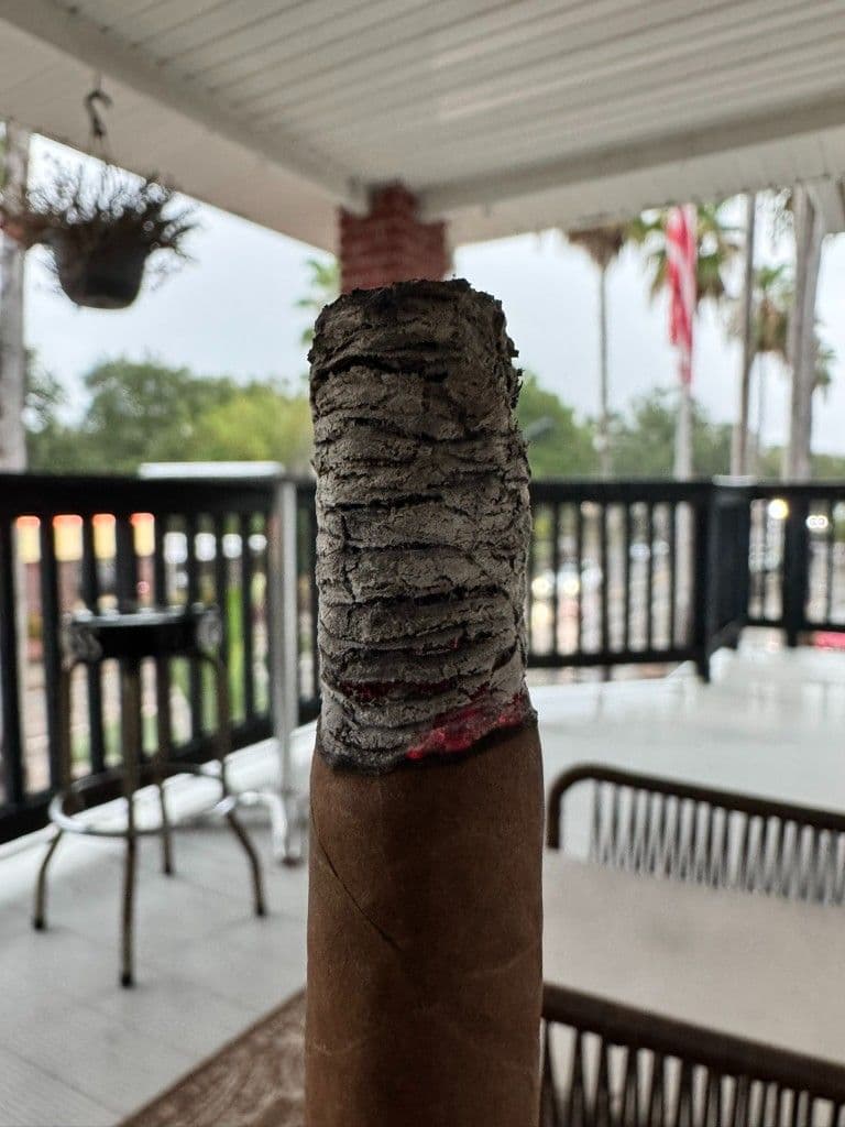 La Colmena 10th Anniversary with long stacked ash on a porch