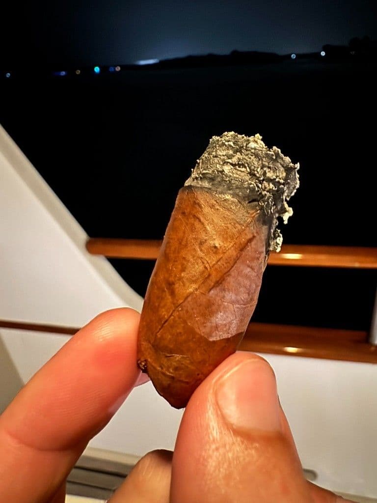 Final nub of the Patoro XO with uneven burn and flaky ash